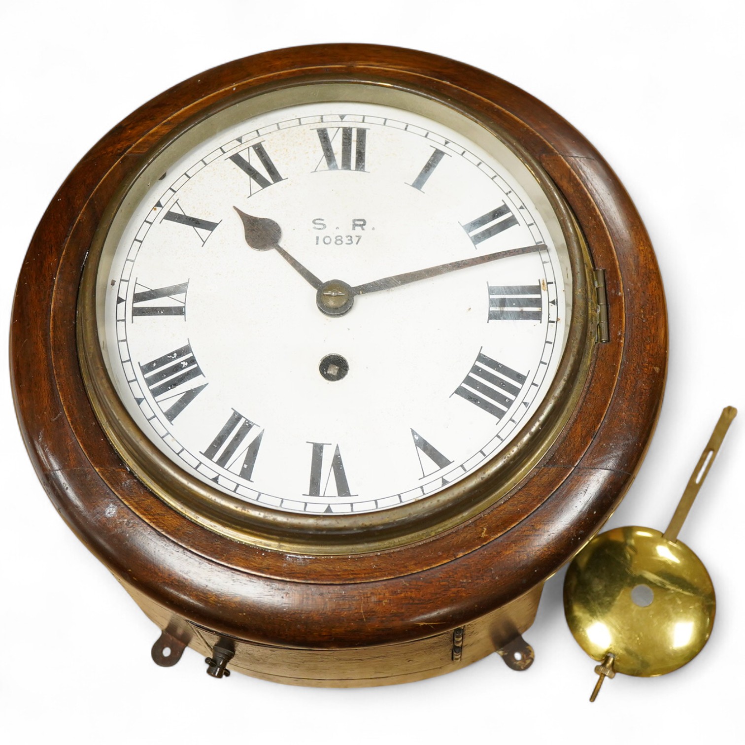 A mahogany wall dial fusee timepiece, the eight inch dial painted with ‘S.R. 10837’, intended to stand for Southern Railway, the reverse of the case also stamped with 10837